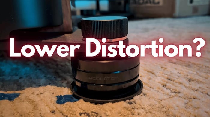 Isoacoustics GAIA Neo speaker feet providing advanced vibration isolation for improved sound clarity.