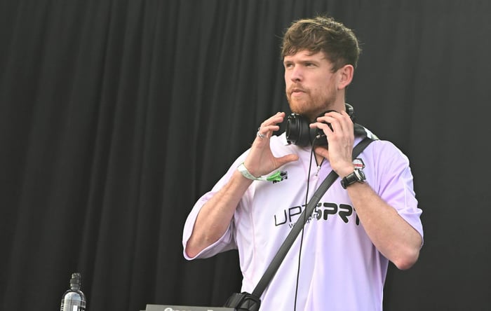 James Blake performing live on stage