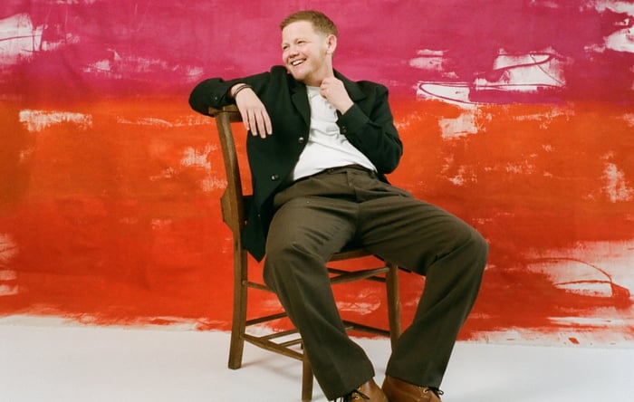 Kae Tempest in a promotional photo, exuding creative energy.