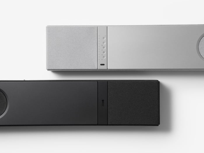 KEF XIO soundbar mounted on wall