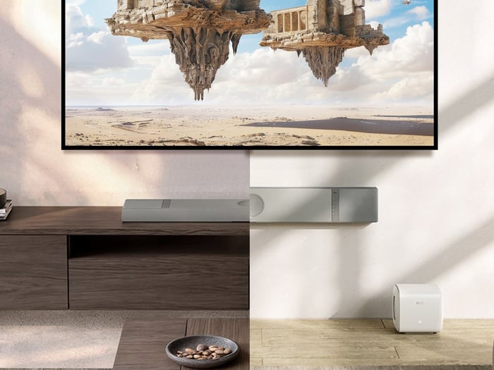 KEF XIO soundbar closeup showing fabric texture and aluminum panel