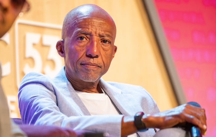 Kevin Liles speaks on stage in 2024