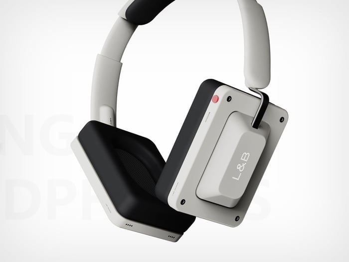 Top view of the headphones showing the control button and keycap surface