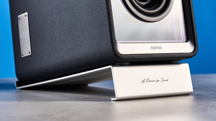 Edifier QR65 speakers on a sleek gaming desk