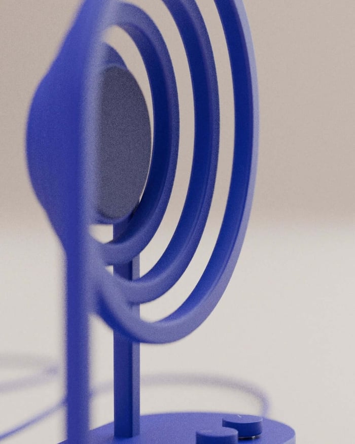 Close-up of the speaker driver encircled by wave-like loops