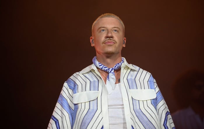 Macklemore performing onstage