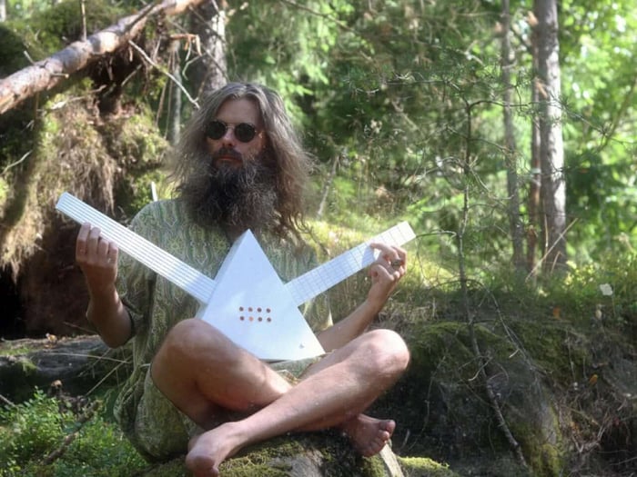 Amber controls on the white triangular surface, glowing warmly