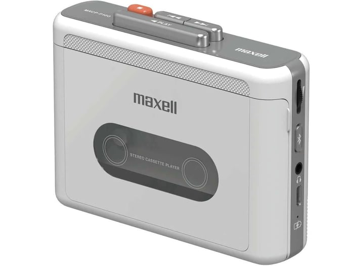 Side view showing volume dial and transport buttons