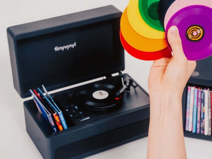 Storage right by the turntable keeps your favorite mini vinyl ready to play.