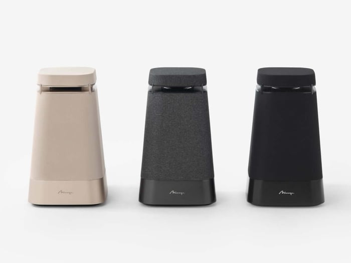 Close-up of speaker design with aluminum pillars and fabric grille