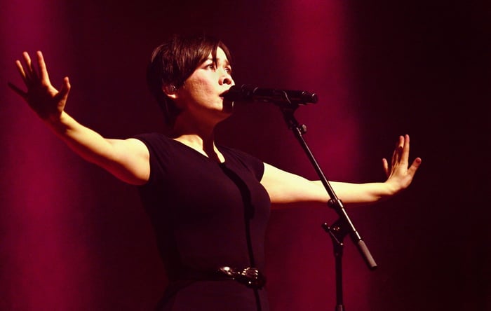 Mitski performing live on stage in London, 2024