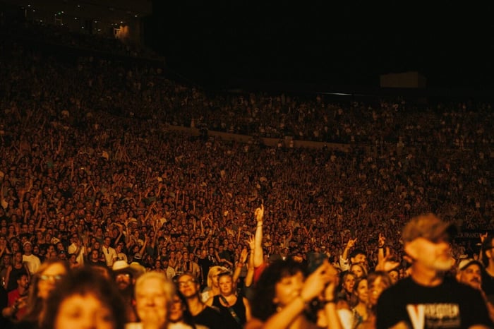 Sunset atmosphere at Folsom Field during concert
