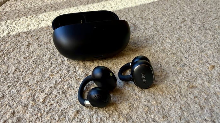 Earfun Clip 2 held in hand showing its clip design