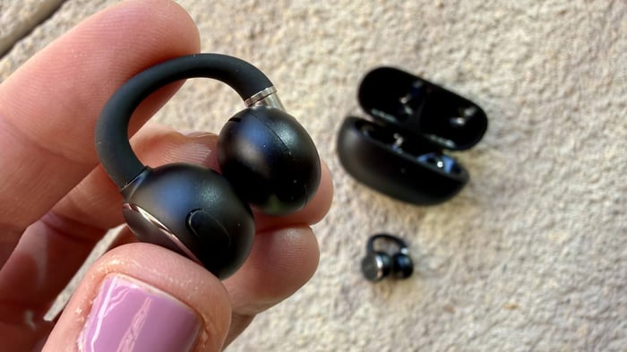 Earfun Clip 2 earbuds with charging case close-up