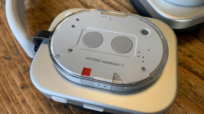 Nothing (1) headphones resting with sleek design