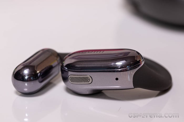 Side view of the earbuds’ stylish metallic finish