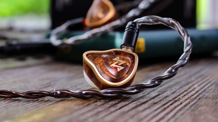 Earbuds connected to sources