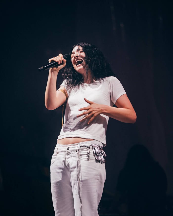 Lorde performing live at Glastonbury 2025