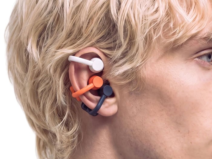 Close-up of CMF Clip Pro earbud with titanium wire structure