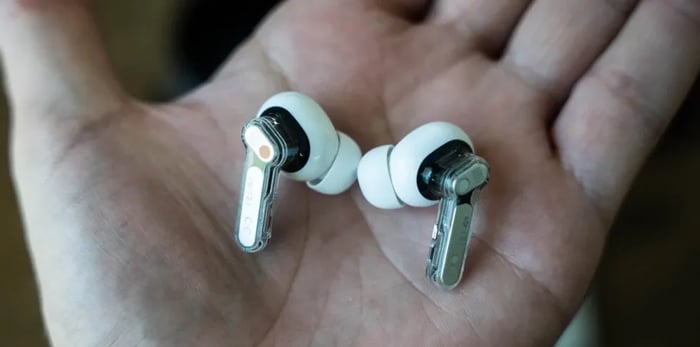 Nothing Ear 3 earbuds with charging case showing Super Mic feature
