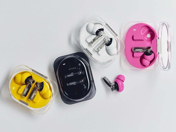 Close-up of Ear (3a) earbuds inside case