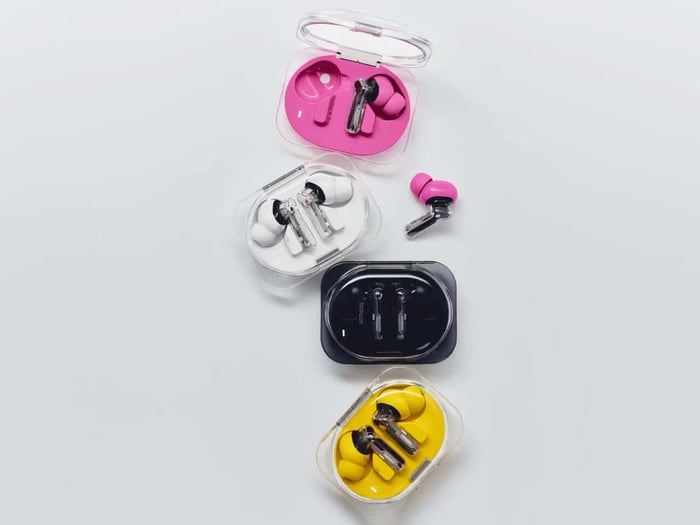 Close-up of Ear (3a) earbuds in case with charging LED