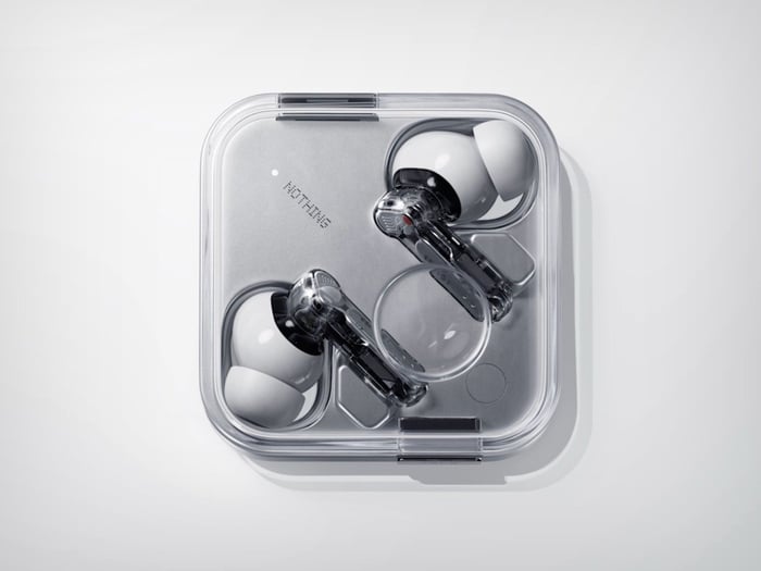 Close-up of Nothing Ear (3) charging case featuring the Super Mic button