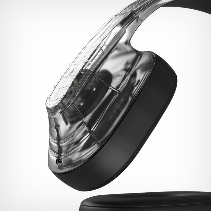 Side angle showing Spectrum headphones’ clear housings and padded ear cups