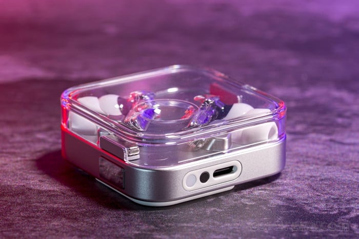 Nothing Ear (3) case and earbuds side view