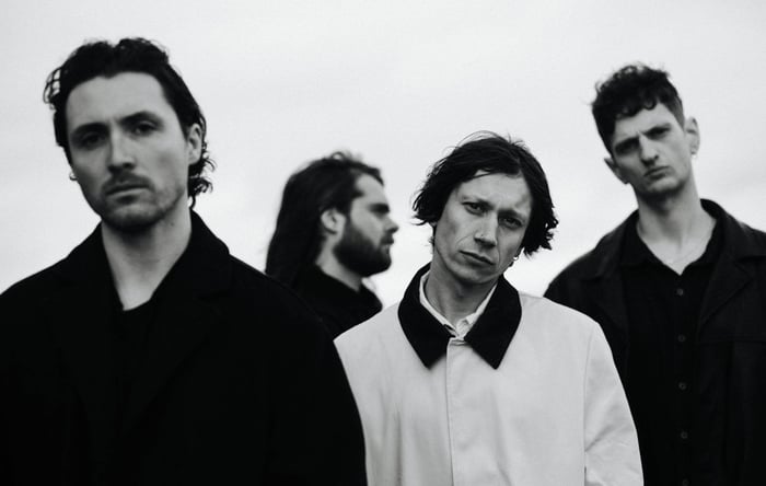 The indie rock quartet October Drift, captured mid-performance.