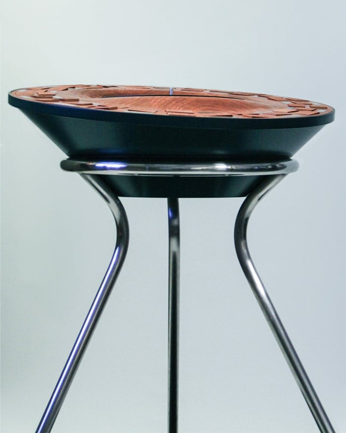 Close up of wooden tiles flipping on Orbit turntable