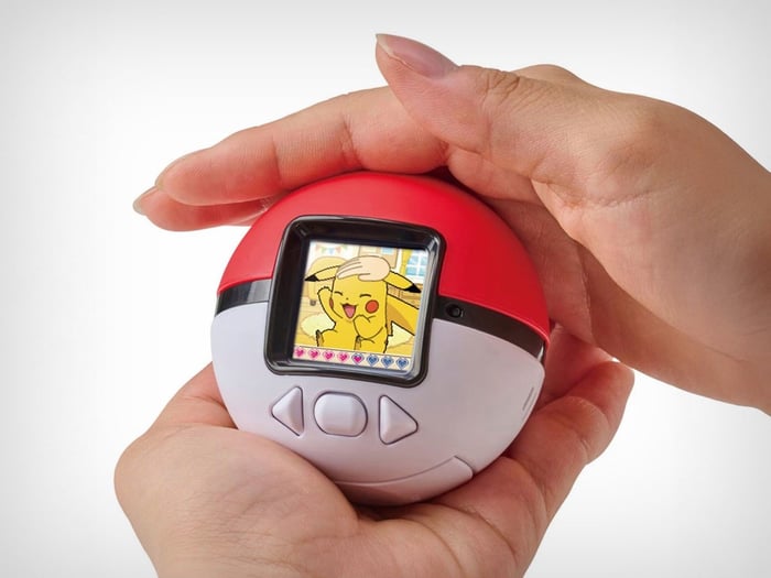 The Poke-Nade Monster Ball brings virtual pets to life with touch-sensitive surfaces and a vibrant color LCD screen.