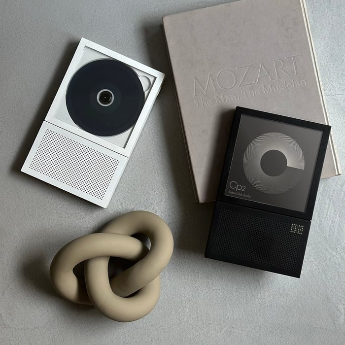 Portable CD Cover Player displaying album art