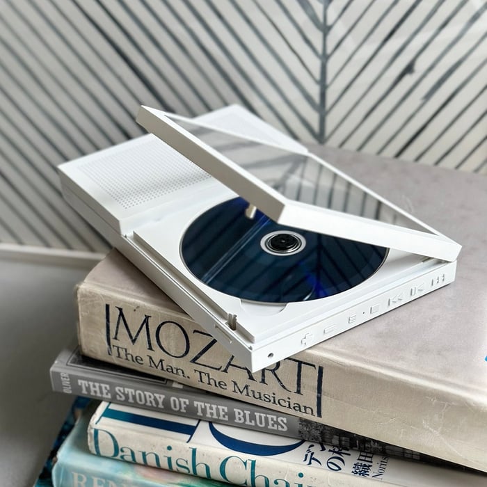 Side angle showing player and album art