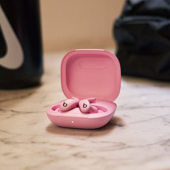 Powerbeats Fit in action, worn during workout