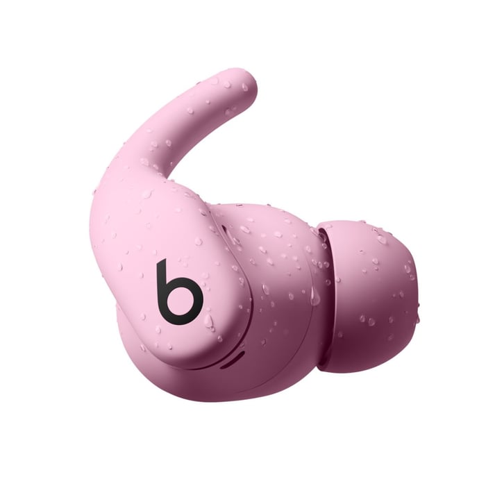 Powerbeats Fit earbuds angled with charging case