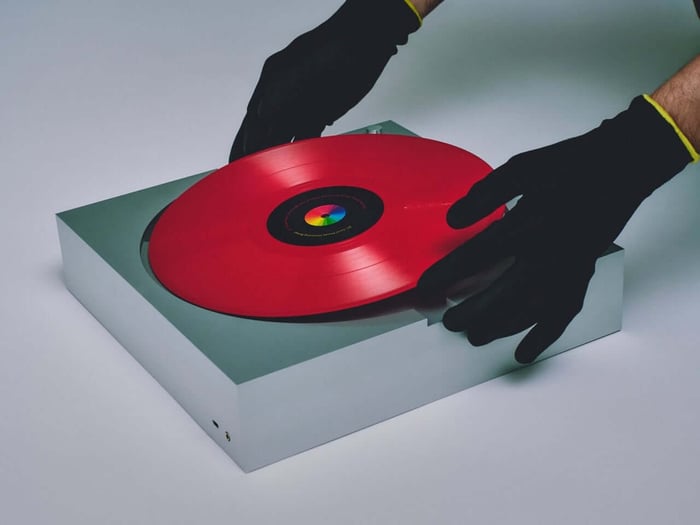 Brutalist vinyl turntable with sleek aluminum design