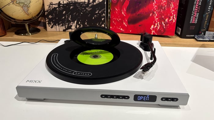 Close-up of Mixx Analog+ tonearm and vinyl playing