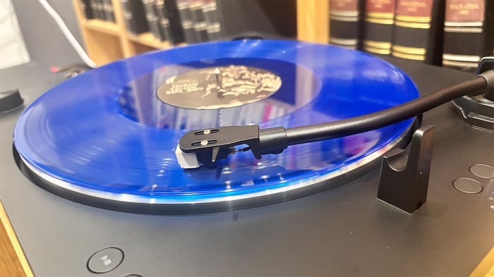 Listening setup with Sharp RP-TT100 connected to high-end amp and speakers