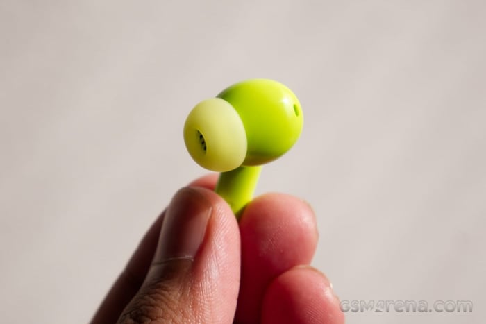 Earbuds placed in charging case