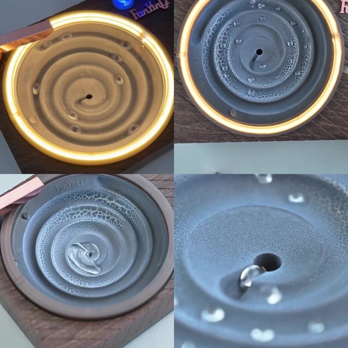 RGB-lit water player glowing softly in a dark interior