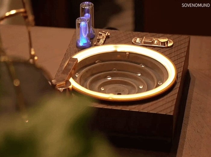 Close-up view of the player’s water basin and compact fountain system