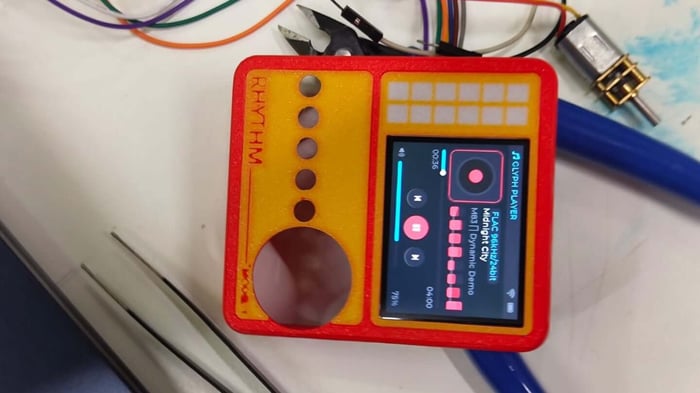 RHYTHM player with rotary encoder, tactile buttons, and compact display