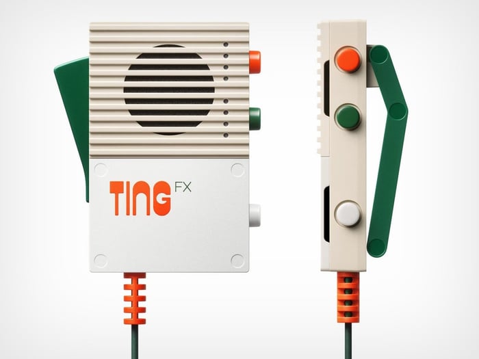 Side view of the Ting microphone highlighting control buttons and ergonomic design