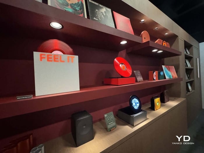 The circular player gives a nod to the hypnotic spin of vinyl records