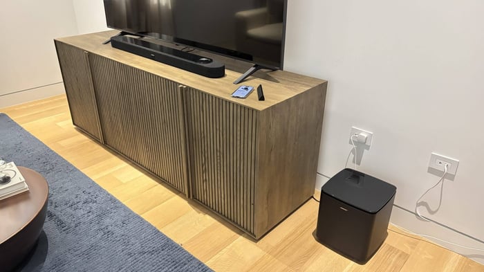 Bose turned a dull plastic box into a stylish centerpiece with fabric and glass details.
