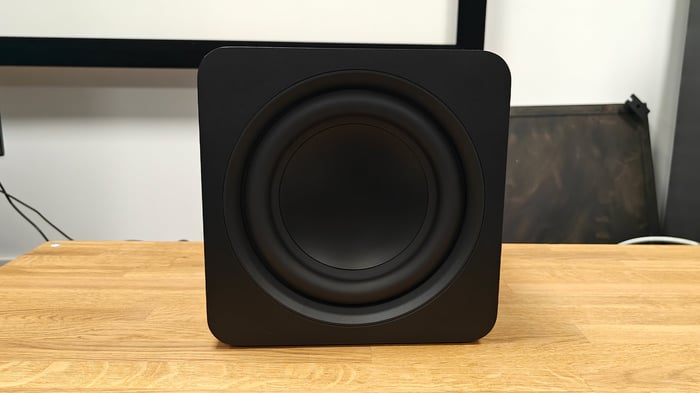 Samsung HW-QS700F soundbar neatly positioned on a shelf