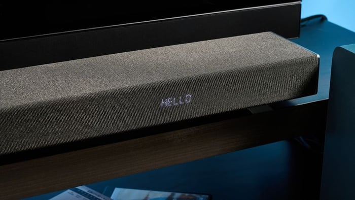 Sharp 3.1.2 features a clean, fabric-covered front panel