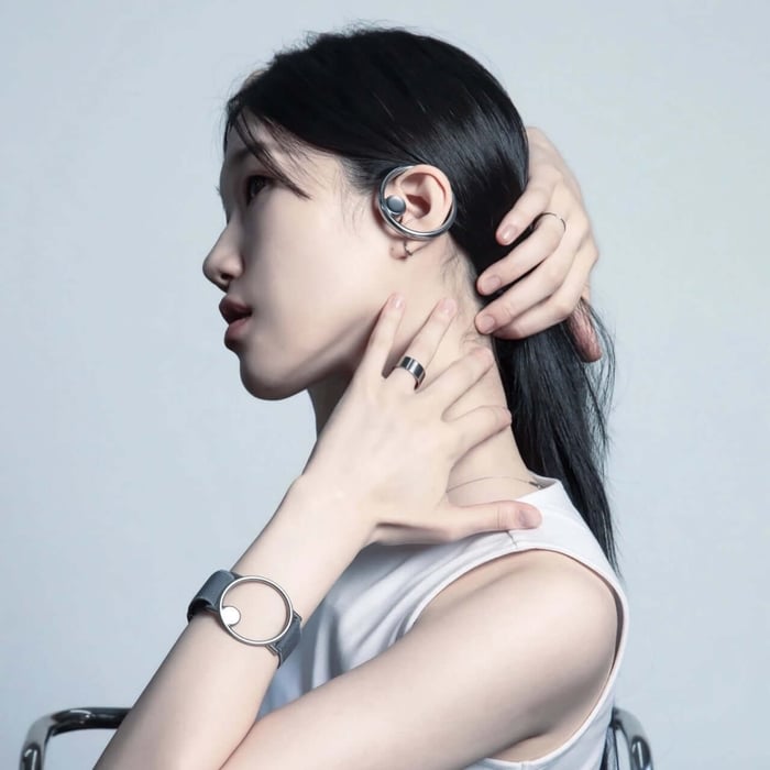 The ear ring snaps magnetically onto the wrist component, creating a stylish wearable