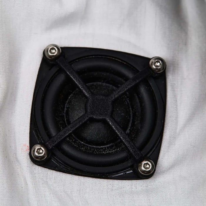 User adjusting dial on jacket
